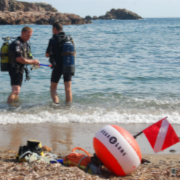 Divers enter the bay at Cabo de Palos